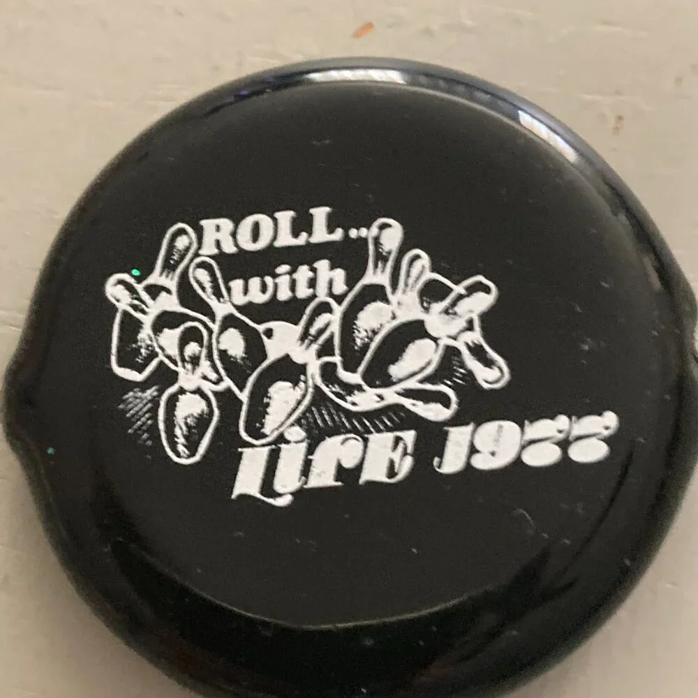 1977 black coin holder - rubber